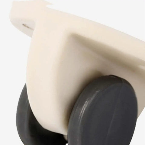 Close-up of Peel And Stick Swivel Casters Smoother Than Snow ABS Ball Bearing for easy furniture mobility.