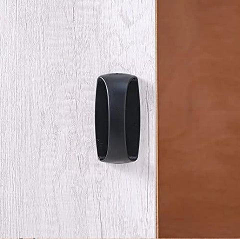 Close-up of 6 Pack Self Stick Cabinet Handles and Drawer Pulls With Adhesive, Drill Free Installation on a wooden surface in black.