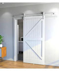 Heavy Duty Double Bypass Sliding Barn Door Hardware Kit With Low Profile Flat Track System gliding smoothly in a modern home.