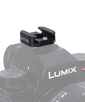 Beast Mode Hot Shoe Mount Adapter with Elastic Rubber Band Wraps around Gimbal Arms and Light Poles installed on a camera.