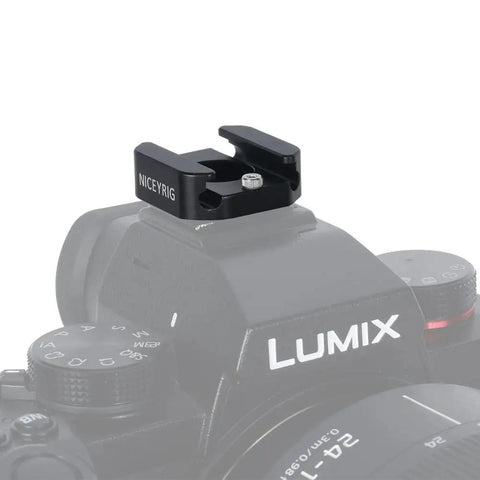 Beast Mode Hot Shoe Mount Adapter with Elastic Rubber Band Wraps around Gimbal Arms and Light Poles installed on a camera.