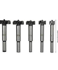 Front view: five-piece steel woodworking drill bit set with sizes 15–35 mm.
