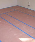 Top Shelf Red Rosin Construction Wrap thirty six inches wide two hundred feet long heavy duty building paper laid flat on a floor.