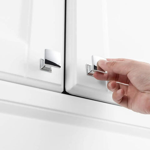 Hand opening a cabinet with Curved Square Top Cabinet Knob Chrome Pull Handle 25mm Pack Of 25 For Kitchen Cupboard Doors Bedroom Dresser Drawers