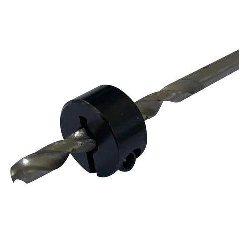 Close-up of Pro Grade Drill Stop Bit Collar Set With Wrench 9 Piece for precise depths, attached to a drill bit.