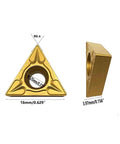 Carbide turning insert TCMT32.51; front triangular view with central hole; 16mm wide, gold coating; side view shows 3.97mm thickness.
