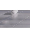 Applying Two Step Home Floor Watercolor Coating Kit White With Easy Diy Application on tile floor using roller brush
