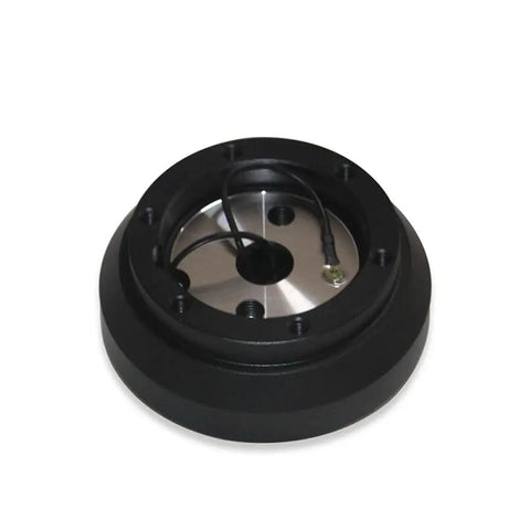 Racing Steering Wheel Short Hub Adapter For 240SX S13 S14 With SR20 Or KA24 Engines Easy Install shown in black and silver.
