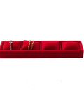 Slick Velvet Watch Tray And Jewelry Organizer 2 Piece Set Featuring Four Compartments With Mini Pillows For Stashing Watches Bracelets And Bangles In Dope Everyday Style showing red velvet tray with three extra compartments.