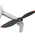 Close-up of DJI Mini 2 SE drone with installed 16Pcs Replacement Propellers For DJI Mini 2 SE Drone Mavic Mini 2 SE 4726 Propeller Blades Kit
