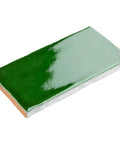 Viva Antic Verde 3x6 Ceramic Wall Tile With Dope Glazed High Sheen Finish, close-up showing green crackle glaze and uneven edges.