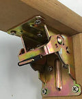 Close-up of mounted iron folding hinge table leg brackets foldable for tables and chairs self locking feet hinges durable iron construction