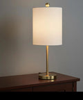 Fresh White Linen Drum Lamp Shade With Brass Spider Fitter For Table Lamps, 8 Inch Wide Cylinder Style, on wooden table.