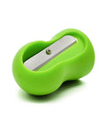 Green handheld vegetable spiral slicer with stainless steel blade, close-up view