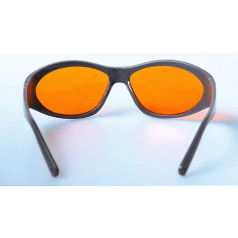 Badass Blue and Green Laser Safety Glasses with OD 5 Plus Protection Covering 266 355 515 532 Nanometers CE EN 107 Model GHP 55 front view with orange lenses.