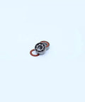 Close-up of MR115RS 2RS Color Bearing Set for hobby electric RC cars and trucks showing sealed orange bearings.