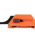 Orange utility knife blade dispenser with slider, holding fifty triple-ground blades for tough material cuts on job sites.