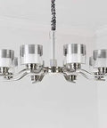 Slick Nickel Four Bulb Led Pendant Chandelier casts pure 5500k white light with a modern design and glass shades.