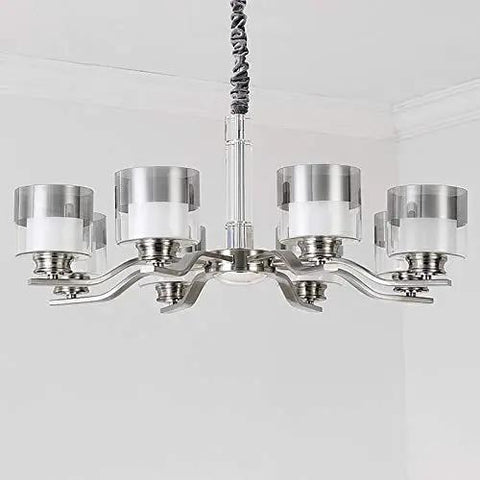 Slick Nickel Four Bulb Led Pendant Chandelier casts pure 5500k white light with a modern design and glass shades.