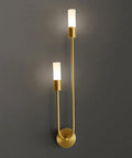 UPRENXIAO Modern Wall Sconce Linear Curved Design Up Down Lighting Ambient(Gold) with two vertical lamps on a wall.