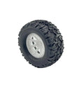 Single wheel from Four Pack 55mm Toy Car Wheel Set With 3mm Shaft Axles For RC Cars And DIY Model Builds, showing rubber tire