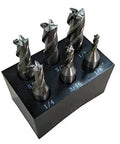 Six end mills (4-flute, center-cut) on a black plastic stand; sizes 1/8 in, 3/16 in, 1/4 in, 5/16 in, 3/8 in, 1/2 in with 3/8 in shank