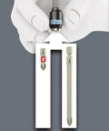 Hand holding stainless bit from Stainless Bit-Check 30 Set With Rapidaptor Bit Holder And Quick Release Chuck, shown with two bits