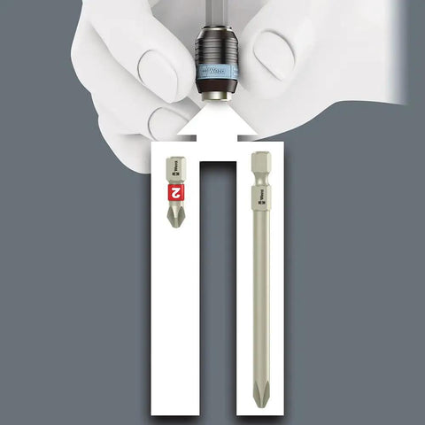 Hand holding stainless bit from Stainless Bit-Check 30 Set With Rapidaptor Bit Holder And Quick Release Chuck, shown with two bits