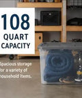 Tackle The Mess Fast With This Beast Mode 108 Quart Stackable Storage Bin Packing Dang Solid Snap Latches And Crisp Clear Plastic For Foolproof Closets And Garage Decluttering, showcasing clear plastic bin holding blankets.