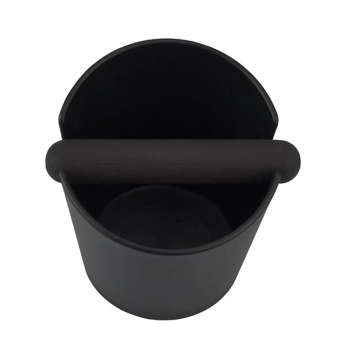 Top view of Coffee Knock Box Pro Round With Shock Absorbent Base And Removable Bar Non Slip, featuring a black durable design.
