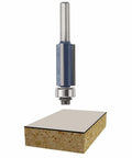 Half Inch Carbide Tipped 3 Flute Flush Trim Router Bit Pro Grade With Shielded Pilot Bearing shown above laminate piece