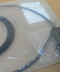 Through-Beam Fiber Optic Photoelectric Sensor Cable for Industrial Automation, E32-Tc200 compatible, in packaging on table surface.