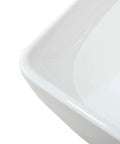 Close-up of white ceramic corner of All In One White Ceramic Vessel Sink And Brushed Nickel Faucet Combo For Bathroom Vanity