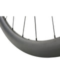Close-up of Killer Lightweight Carbon Wheelset 700c Disc Brakes Road Bike Wheels Clincher Tubeless Ready 45mm Deep Section.