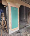 Slick Paintable Large Access Panel For Drywall Hidden Plumbing Inspection Door being installed in a wall, showcasing flush design.