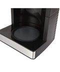 Close-up of a black and silver coffee machine tray