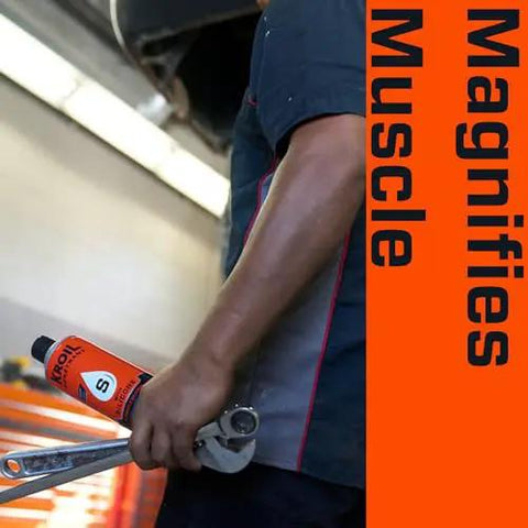Person holding tool and penetrating oil can in workshop with 'Magnifies Muscle' text.