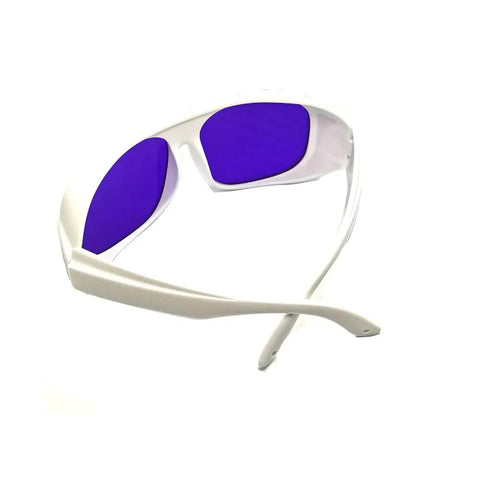 Heavy Duty Yellow Laser Safety Glasses Serving Straight Up Tough Eye Armor For 560 To 600nm Wavelengths With OD 6 Plus Coverage built with white frame and purple lenses.