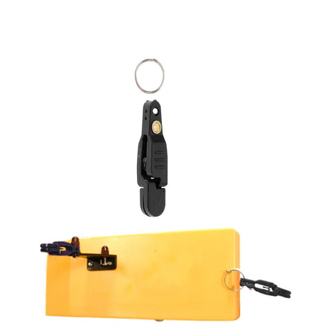 Keproving fishing line release clip, black plastic with O-ring; shown detached and mounted on an orange planer board.