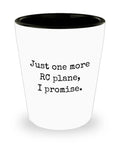 RC Planes Gift For Enthusiasts Ceramic Shot Glass With RC Aircraft Theme One And A Half Ounces White Exterior Black Interior Dishwasher Safe Perfect Just One More RC Plane Joke Gift For Pilots And Hobbyists, text 'Just one more RC plane, I promise.' on white ceramic shot glass with black interior