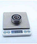 Rock Solid CSK6004 One Way Bearing Clutch 20x42x14mm on digital scale weighing 81.29 grams for power tools.