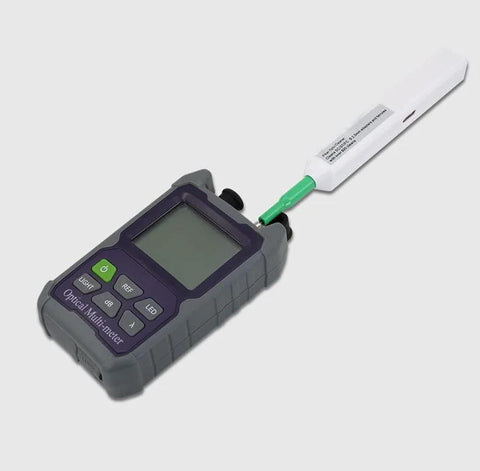 Handheld optical multimeter with attached white fiber-optic cleaning pen and green connector