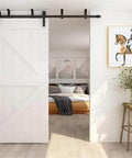 Installed Four To Thirteen Feet Ceiling Mounted Barn Door Sliding Hardware Kit With Anti Rust Rails Featuring Carbon Steel Rollers in bedroom