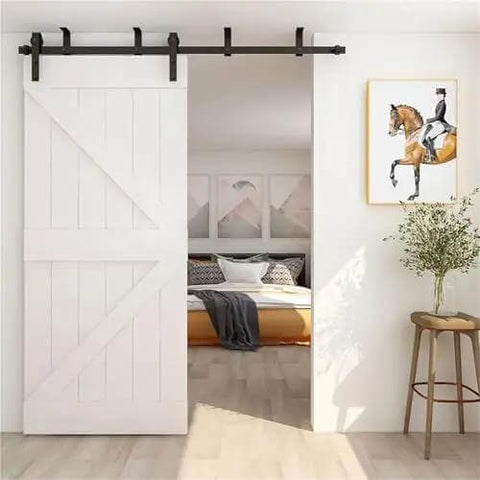 Installed Four To Thirteen Feet Ceiling Mounted Barn Door Sliding Hardware Kit With Anti Rust Rails Featuring Carbon Steel Rollers in bedroom