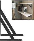 Black heavy duty shelf brackets with L corner braces, triangular tripod style, installed as floating shelves in rustic wood shelving setup.