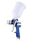 Pro Hustle Slick Finish Pneumatic Spray Gun For Automotive And Furniture Refinishing Featuring High Atomization 1.7 Nozzle And Roomy 600 Milliliter Cup For No Sweat Primer Runs side view with white cup and blue body