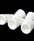 Ceramic wire connectors, four white porcelain caps for high-temperature electrical repairs