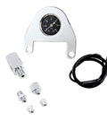 Twin Cam oil pressure gauge kit with silver mounting bracket, black dial gauge, wiring, and metal adapters.
