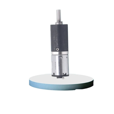 N20 Micro Metal Planetary Gearbox Reducer Motor With 64 To 1 Step Down Ratio For Sweet Running Precision and Hardworking Torque Output On Custom Robot Frames And Diy Tech Builds mounted vertically over a flat surface.