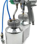 Heavy Duty Workhorse Pneumatic Spray Gun With Slick Dual Nozzle Setup For Crisp Industrial Finishes Built Hella Tough Using Premium Stainless Steel Internal Parts And Reliable Pressure Feed Operation with dual metal paint cups.